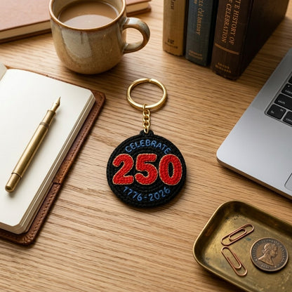 WoolyArtis WoolyArtis 250th anniversary USA keychain with red, white, and blue crochet-style design, patriotic commemorative accessory