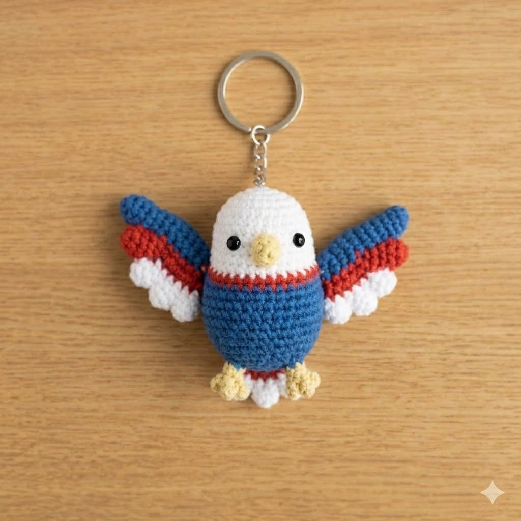 Crochet Bald Eagle keychain by WoolyArtis featuring red, white, and blue patriotic colors, ideal as a 4th of July or Independence Day gift