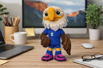 Handmade WoolyArtis WoolyArtis World Cup mascot plush toy with detailed stitching and soft fabric, featuring vibrant colors and a friendly expression.