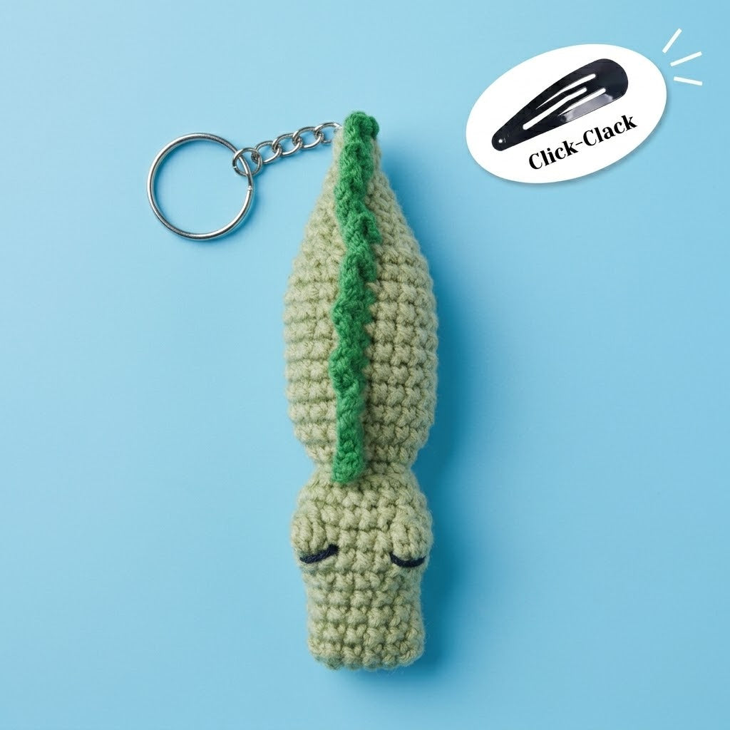 WoolyArtis crochet crocodile fidget keychain with textured body, click-clack stress relief features, and adorable amigurumi design.