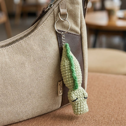 WoolyArtis Crochet Crocodile Fidget Toy keychain with textured amigurumi design, perfect for stress relief and tactile sensory play.
