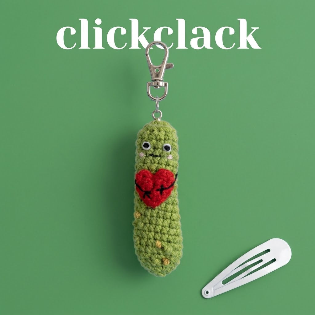 Handmade crochet sensory fidget keychain with bunny, carrot, and pickle designs by WoolyArtis, featuring satisfying click-clack sounds.